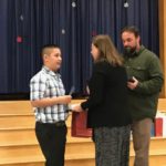 Alexis Alvarez receiving certificate at PSP induction